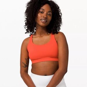 Lululemon Energy Bra *Medium Support, B–D Cups
Color BRICK—size 4